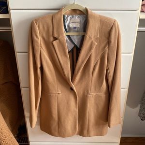 Womens fitted tan blazer never worn before. Brand new condition.